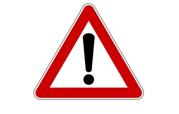 Die Grafik eines dreieckigen Warnschildes mit rotem Rahmen, weißem Hintergrund und einem schwarzen Ausrufezeichen in der Mitte.